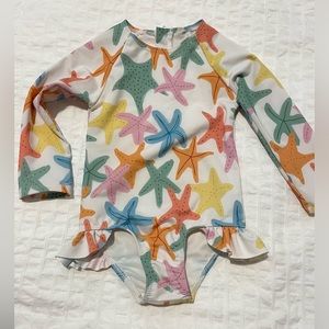 Girls swim. Pearl street swim. Starfish rashguard